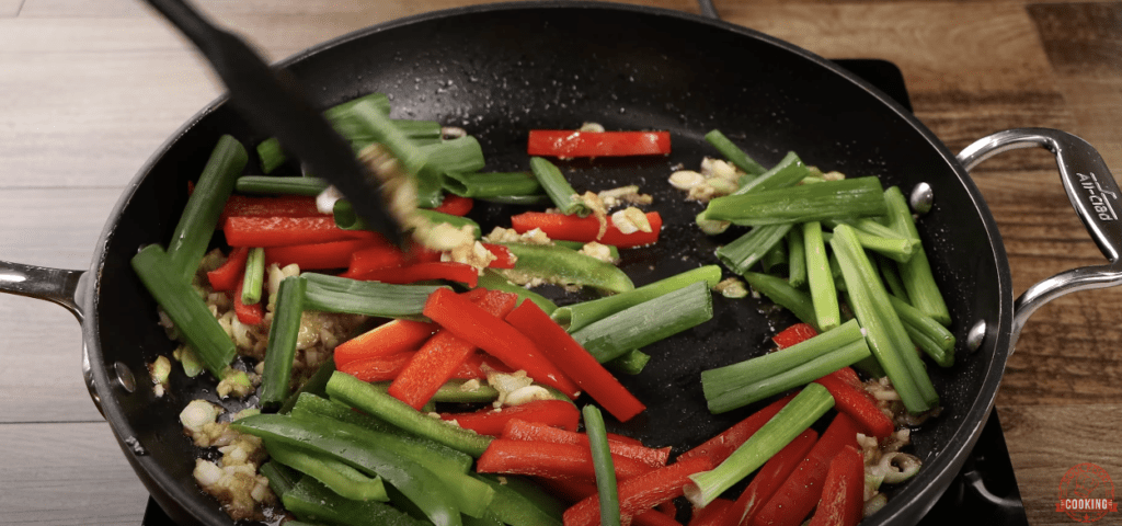 Saute veggies for pepper steak